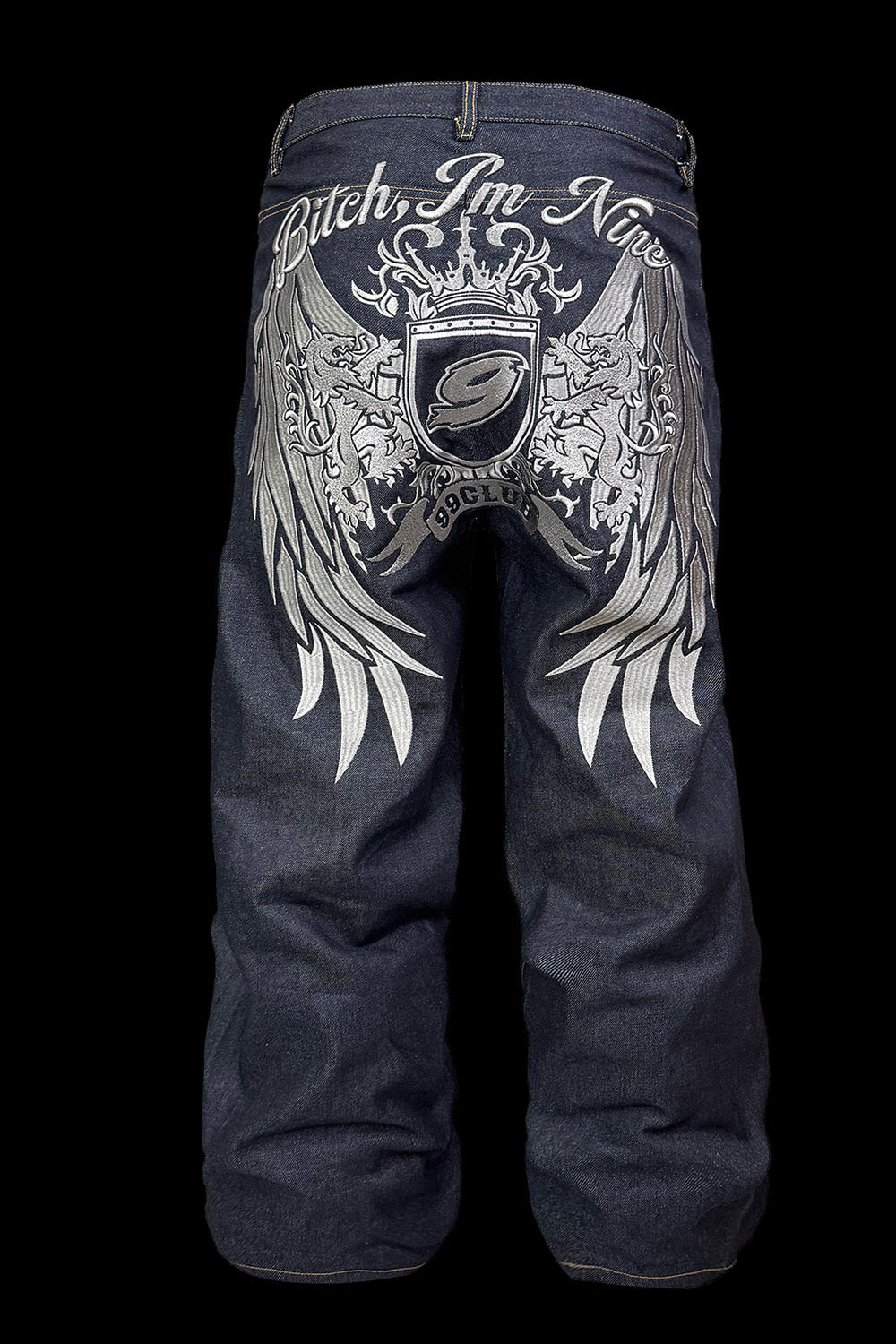 [99CLUB]Royal Emblem Embroidery Denim Pants