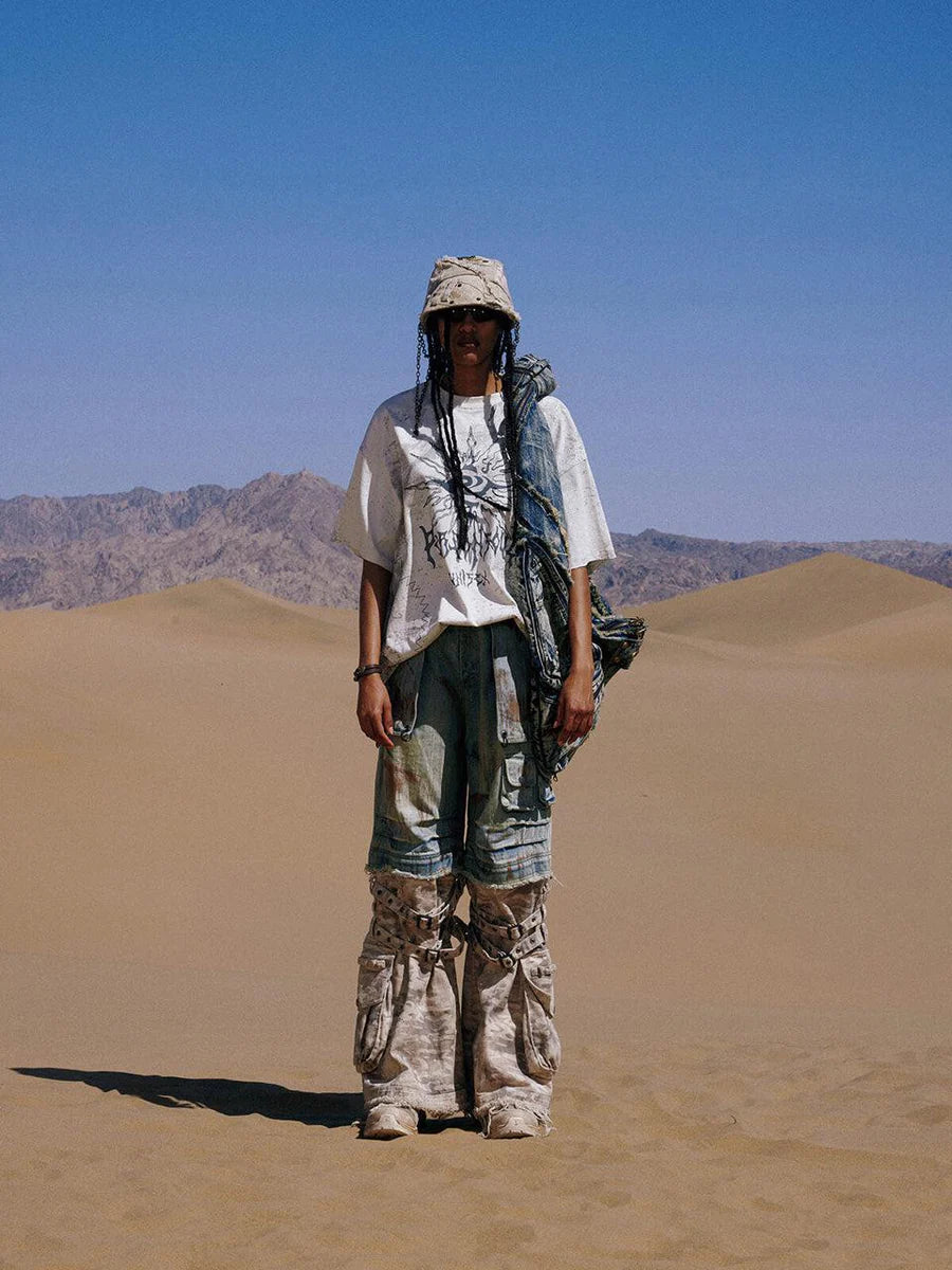 Paneled camo baggy jeans