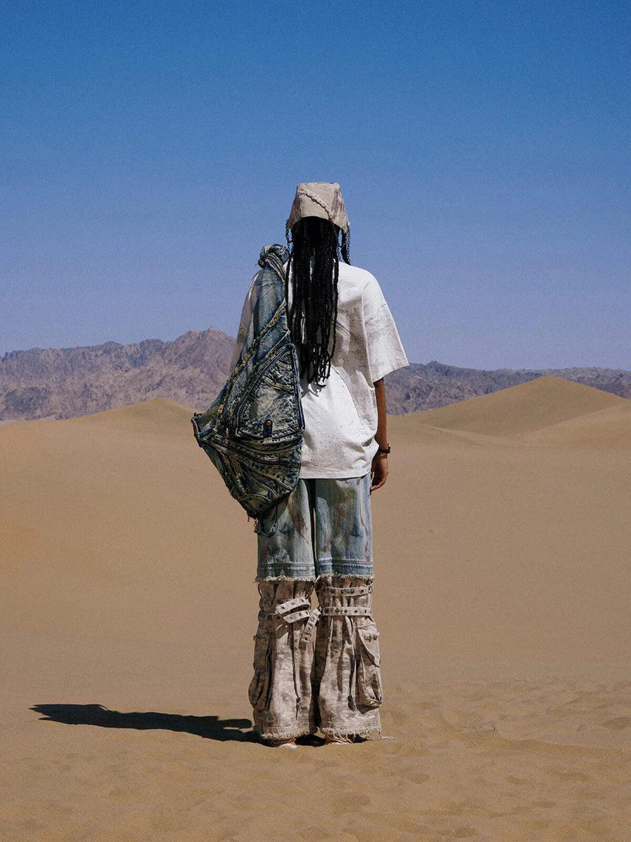 Paneled camo baggy jeans