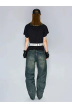 Wave Pattern Curved Blade Denim Pants